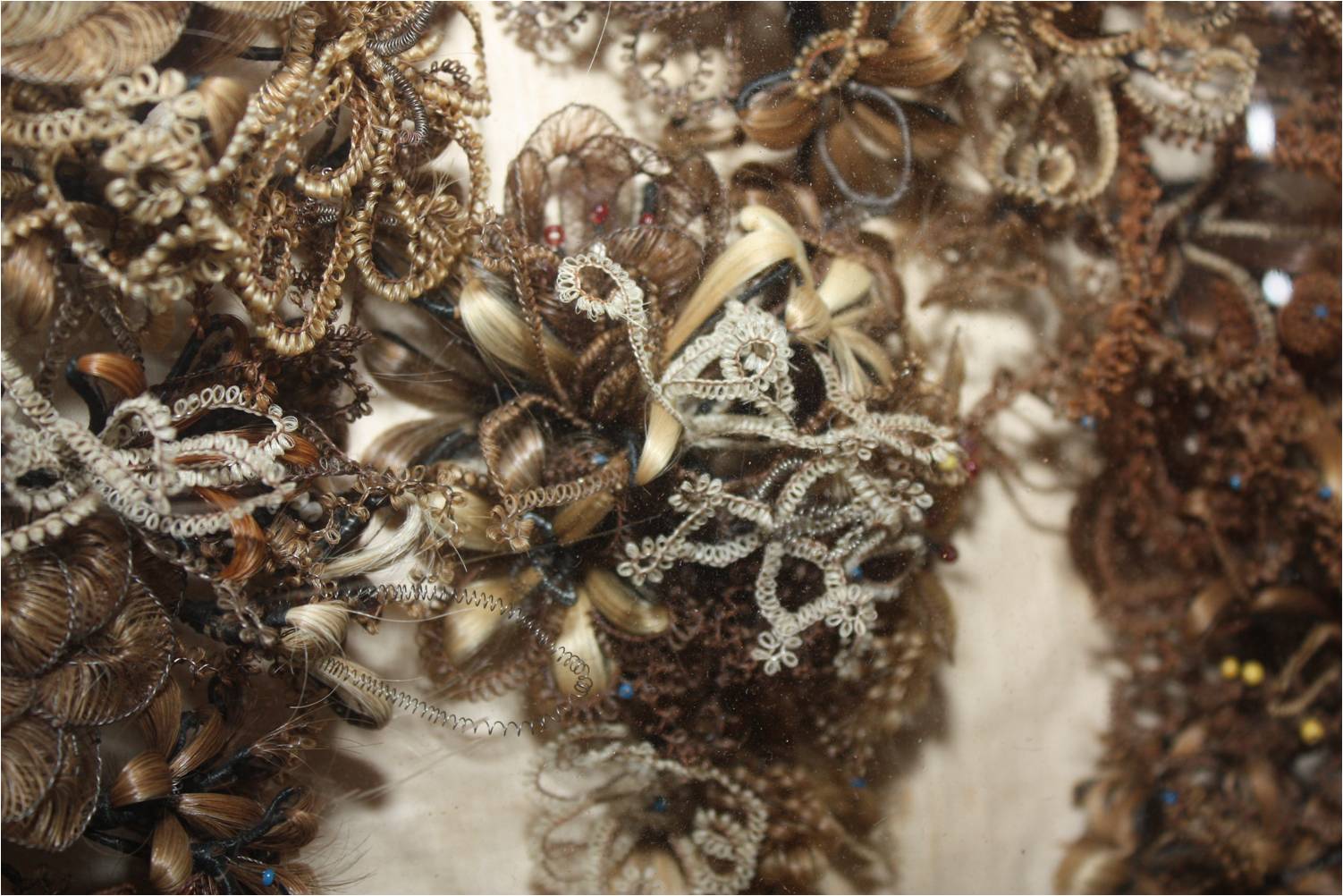 Hair wreath, collection of Prairie Trails Museum in Wayne County, Iowa